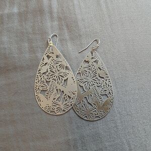 Silver metal butterfly cut out earrings